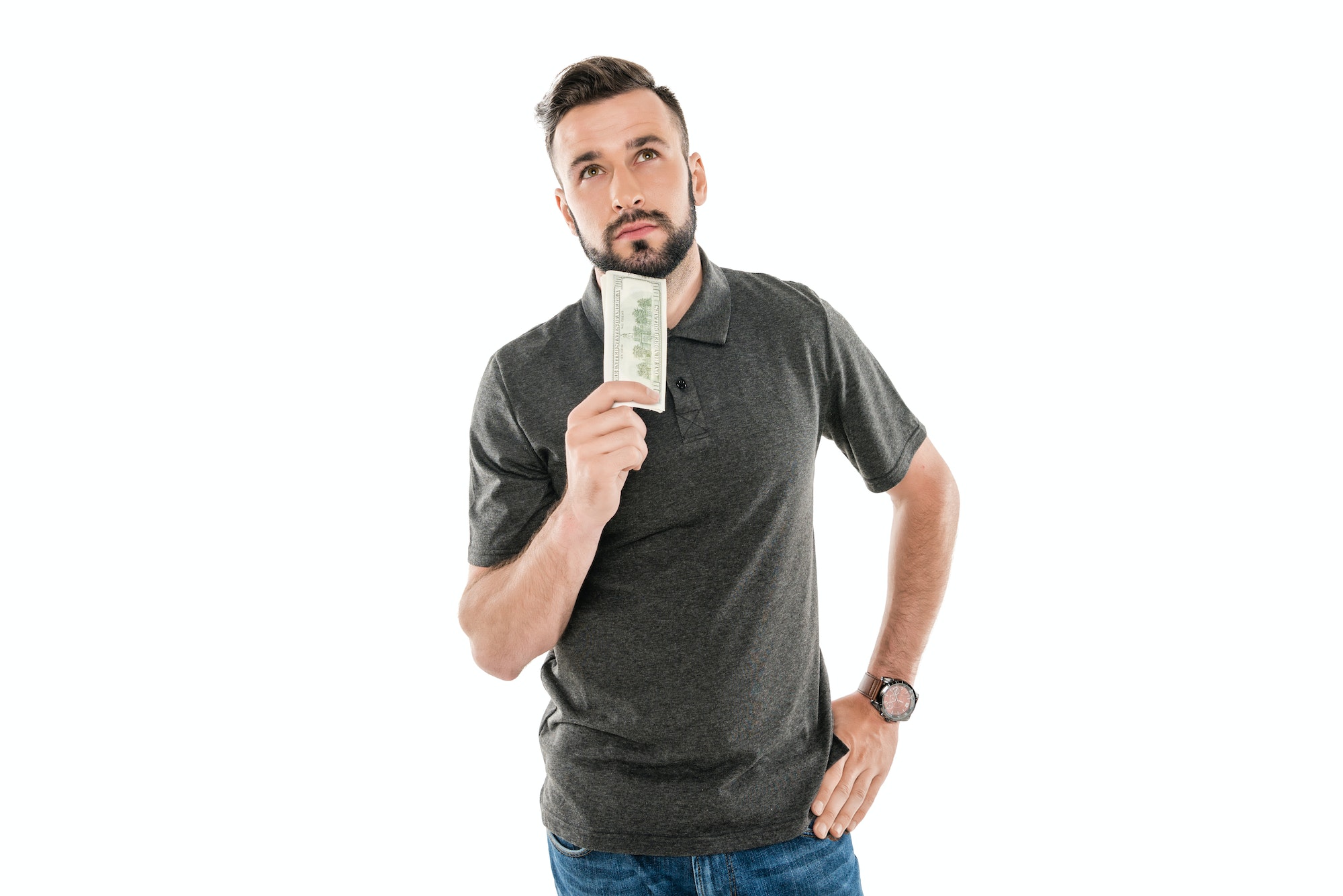 portrait of pensive man with dollar banknote in hand isolated on white